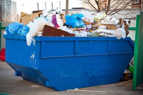 Residents disposing of furniture at a local center in Ruislip
