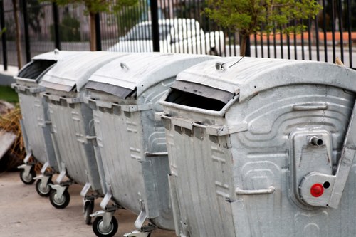 Professional waste clearance team managing builders waste