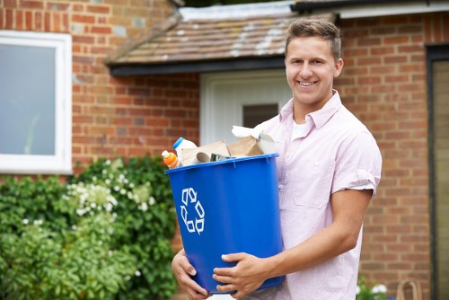 Front view of a commercial waste removal operation in a suburban area
